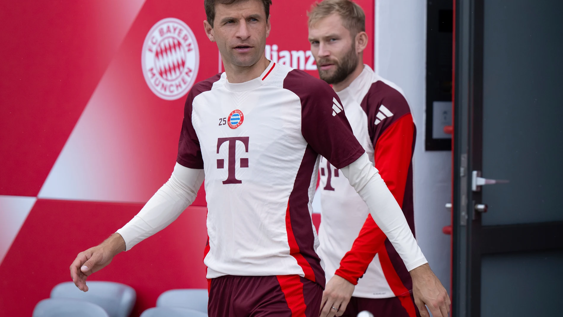 Bayern's Thomas Muller, left, and Konrad Laimer attend a training session, a day before the Champions League opening phase soccer match against Barcelona in Spain, at the Säbener Street training ground in Munich, Germany, Tuesday, Oct. 22, 2024. (Sven Hoppe/dpa via AP)