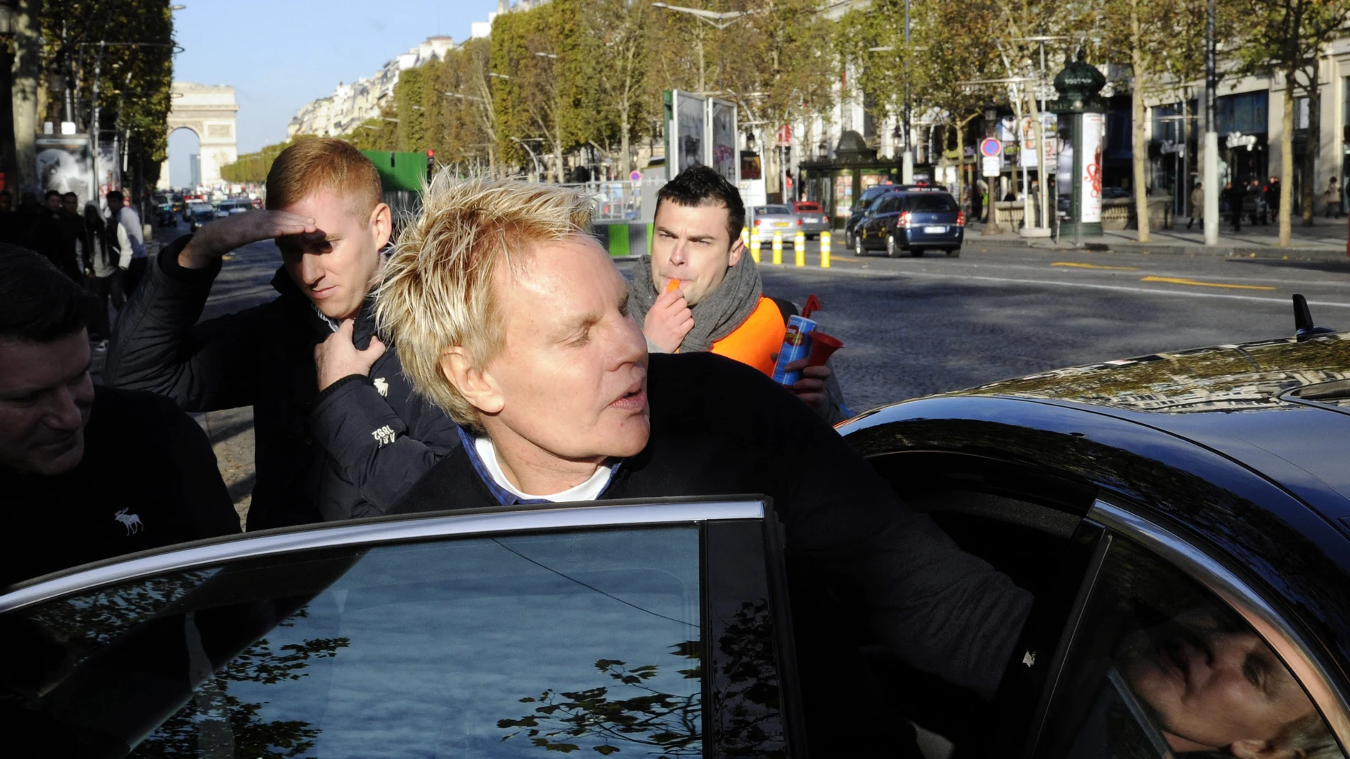 US Mike Jeffries, CEO of US clothing retailer Abercrombie & Fitch leaves the store on the Champs Elysees avenue in Paris