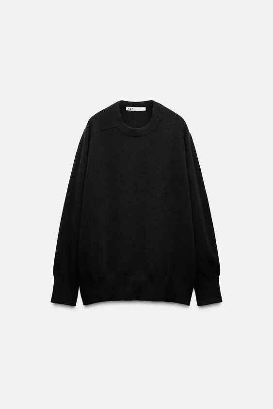 Jersey negro 100% de lana, de Zara (49, 95 euros)