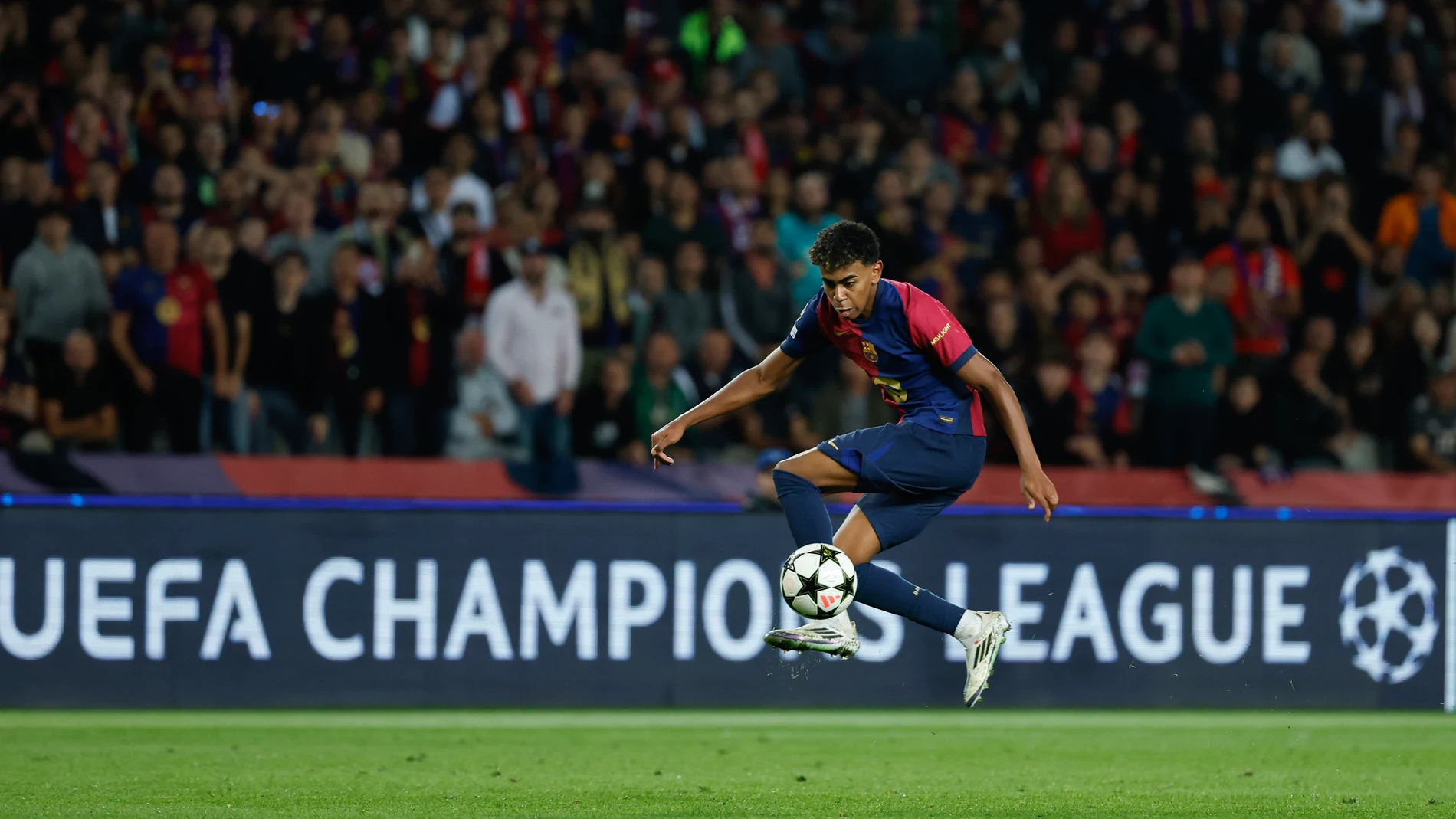 Barcelona's Lamine Yamal controls the ball during a Champions League opening phase soccer match between Barcelona and Bayern Munich at the Lluis Companys Olympic Stadium in Barcelona, Spain, Wednesday, Oct. 23, 2024. (AP Photo/Joan Monfort)