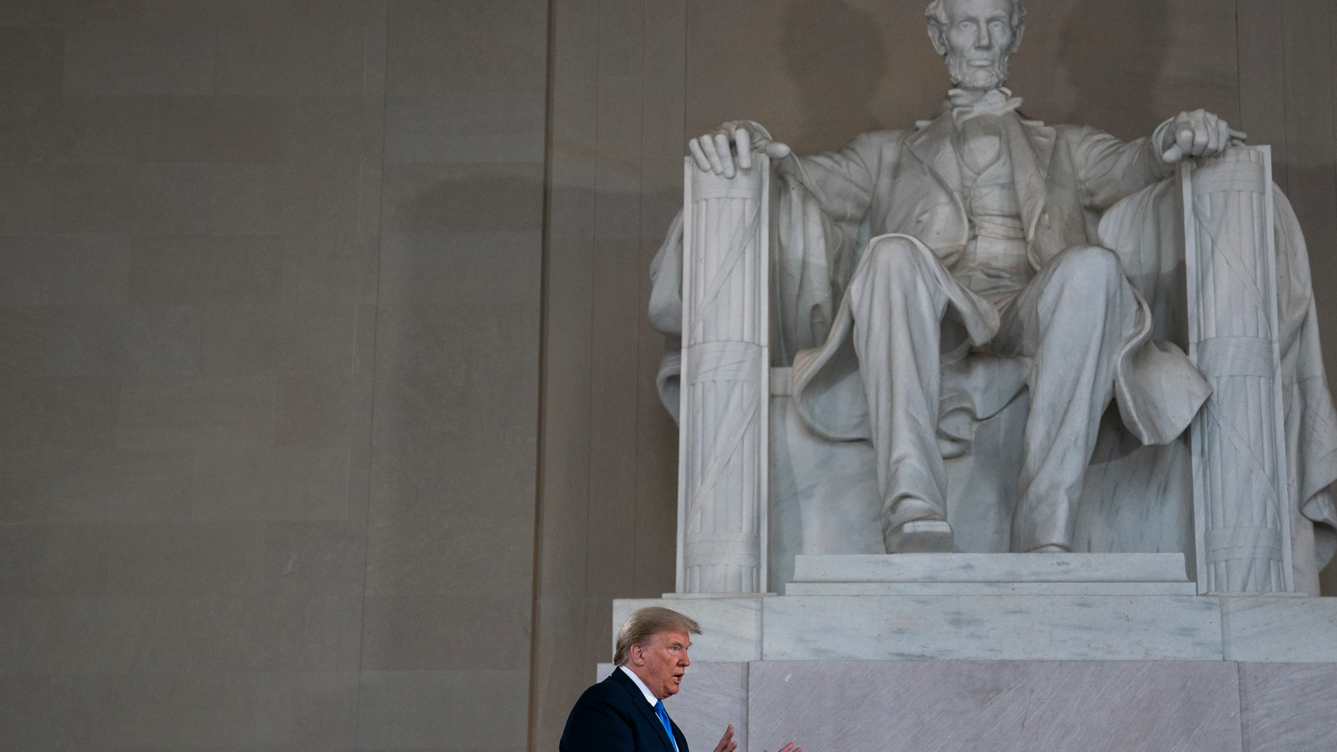 FILE - President Donald Trump speaks during a Fox News virtual town hall from the Lincoln Memorial, May 3, 2020, in Washington. (AP Photo/Evan Vucci, File)