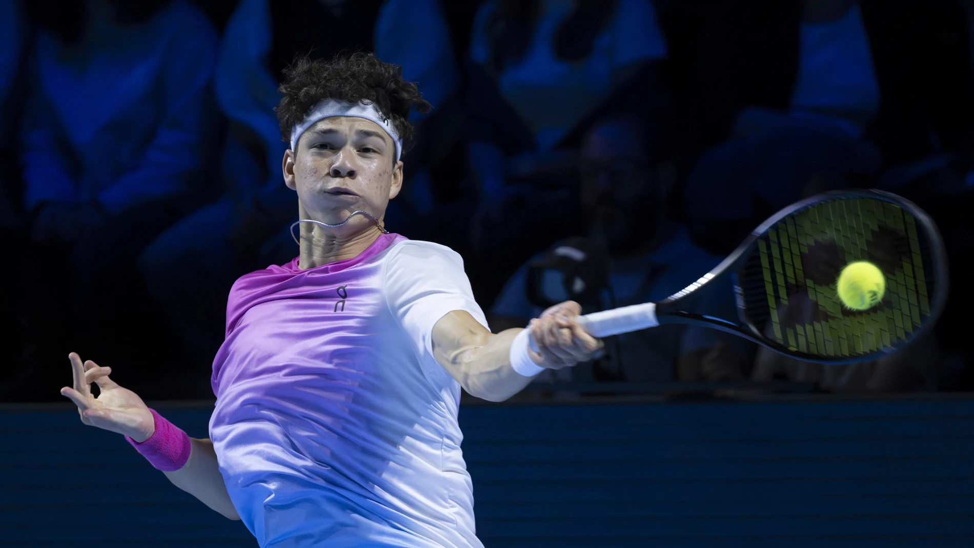 Ben Shelton from the U.S. returns a shot to France's Arthur Fils, during their semifinal match at the Swiss Indoors Basel tennis tournament, at the St. Jakobshalle in Basel, Switzerland, Saturday, Oct. 26, 2024. (Georgios Kefalas/Keystone via AP)