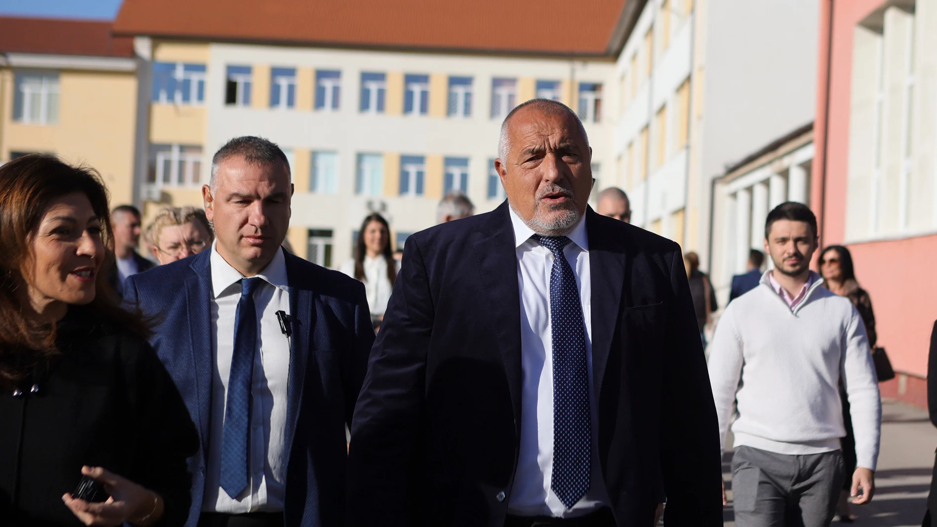 Former Bulgarian Prime Minister Boyko Borissov walks after casting his ballot at a polling station during general elections in Bankya, Bulgaria, Sunday, Oct. 27, 2024. (AP Photo/Valentina Petrova)