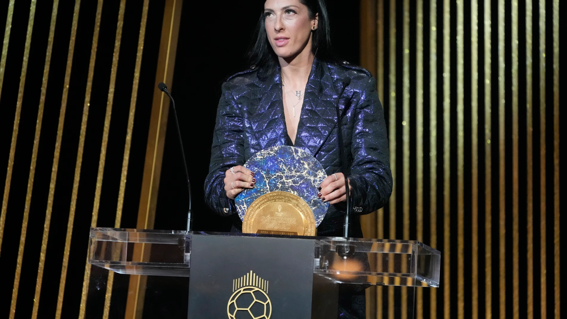 Spanish player Jenni Hermoso holds the Socrates Award during the 68th Ballon d'Or (Golden Ball) award ceremony at Theatre du Chatelet in Paris, Monday, Oct. 28, 2024. (AP Photo/Michel Euler)