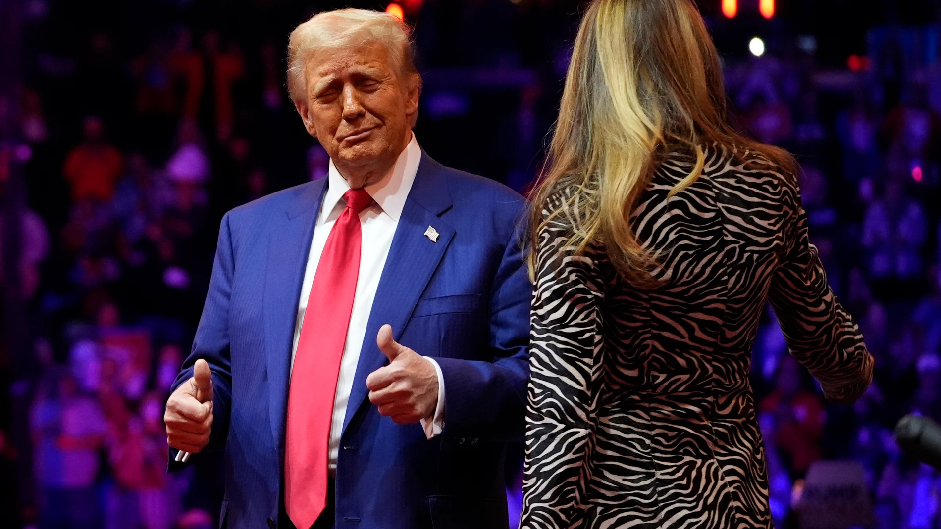 Republican presidential nominee former President Donald Trump and former first lady Melania Trump on stage at a campaign rally at Madison Square Garden, Sunday, Oct. 27, 2024, in New York. (AP Photo/Alex Brandon)