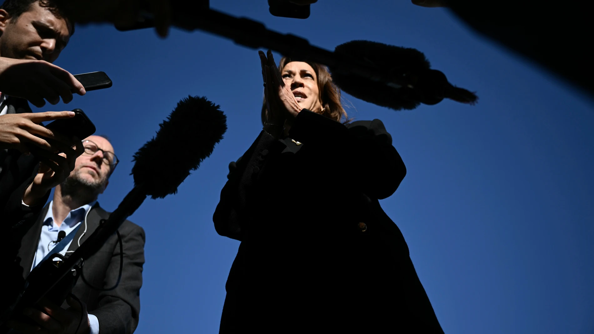 Democratic presidential nominee Vice President Kamala Harris talks to reporters before boarding Air Force Two, Wednesday, Oct. 30, 2024, at Joint Base Andrews, Md. (Brendan Smialowski/Pool via AP)