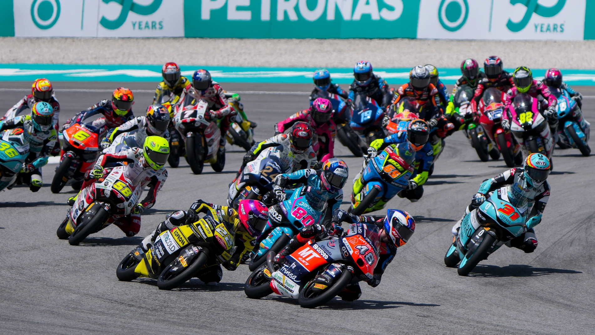 Spanish rider Ivan Ortola of MT Helmets steers his motorcycle as he leads the Moto3 Race in Sepang, outskirts of Kuala Lumpur, Sunday, Nov. 3, 2024. (AP Photo/Vincent Thian)