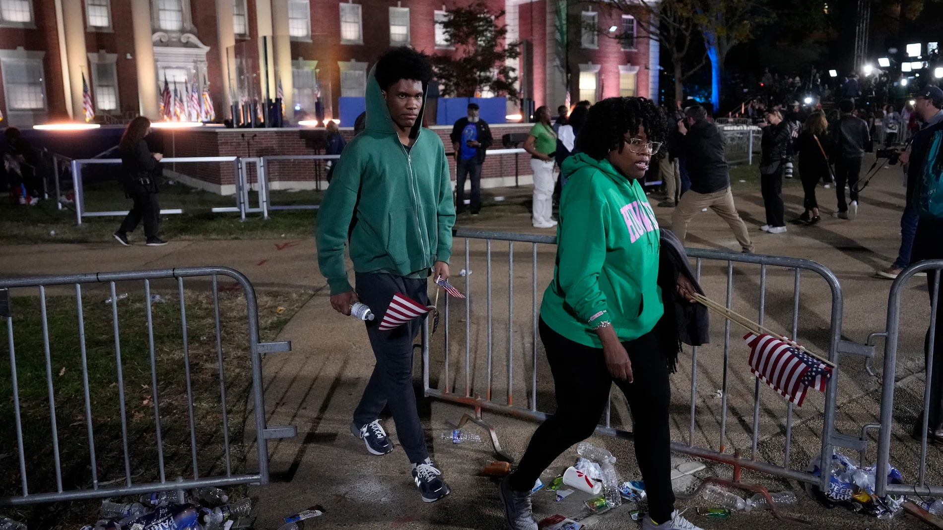 Supporters of Democratic presidential nominee Vice President Kamala Harris leave an election night campaign watch party after it was announced that she would not speak on Wednesday, Nov. 6, 2024, on the campus of Howard University in Washington. (AP Photo/Ben Curtis)