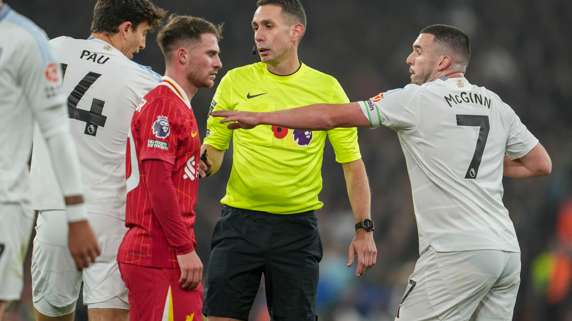 Referee David Coote officiates during the English Premier League soccer match between Liverpool and Aston Villa at the Anfield stadium in Liverpool, Saturday, Nov. 9, 2024. (AP Photo/Jon Super)