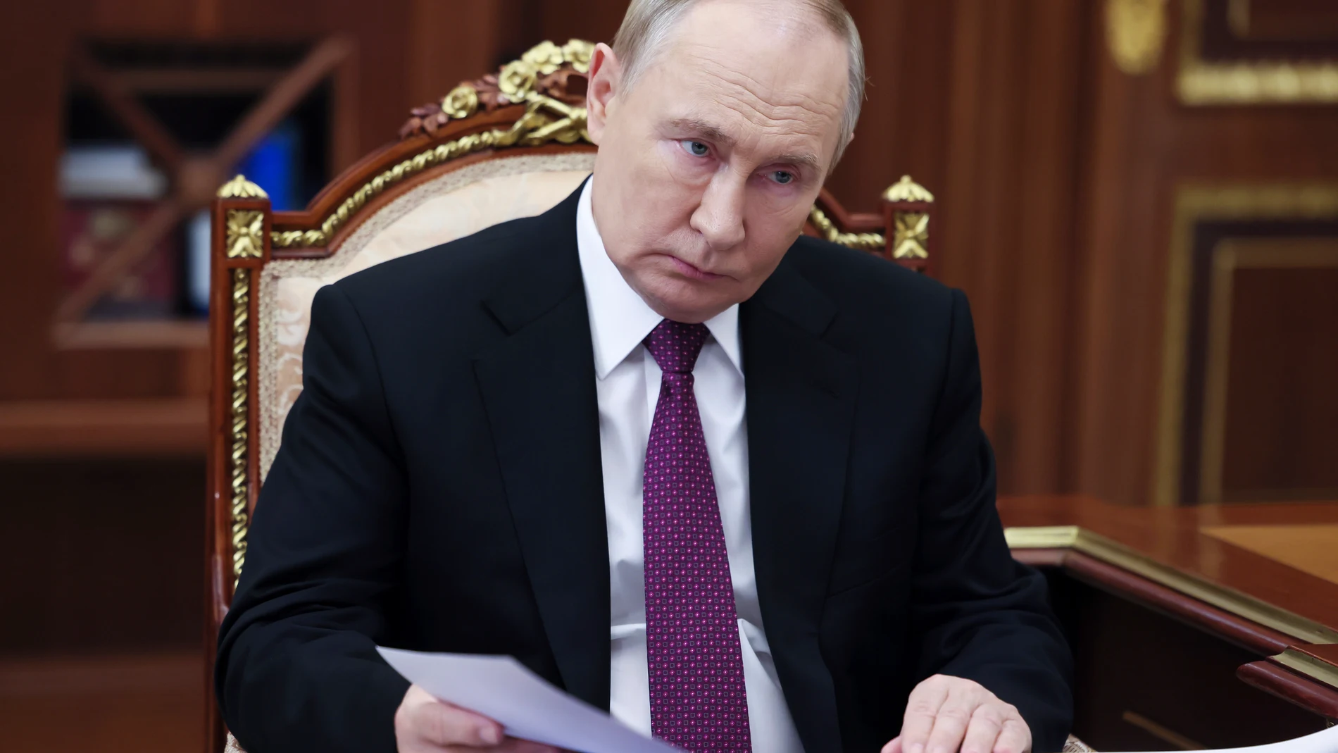 Russian President Vladimir Putin listens to leader of the Liberal-Democratic Party of Russia Leonid Slutsky during their meeting at the Kremlin, in Moscow, Russia, Thursday, Nov. 14, 2024. (Vyacheslav Prokofyev, Sputnik, Kremlin Pool Photo via AP)