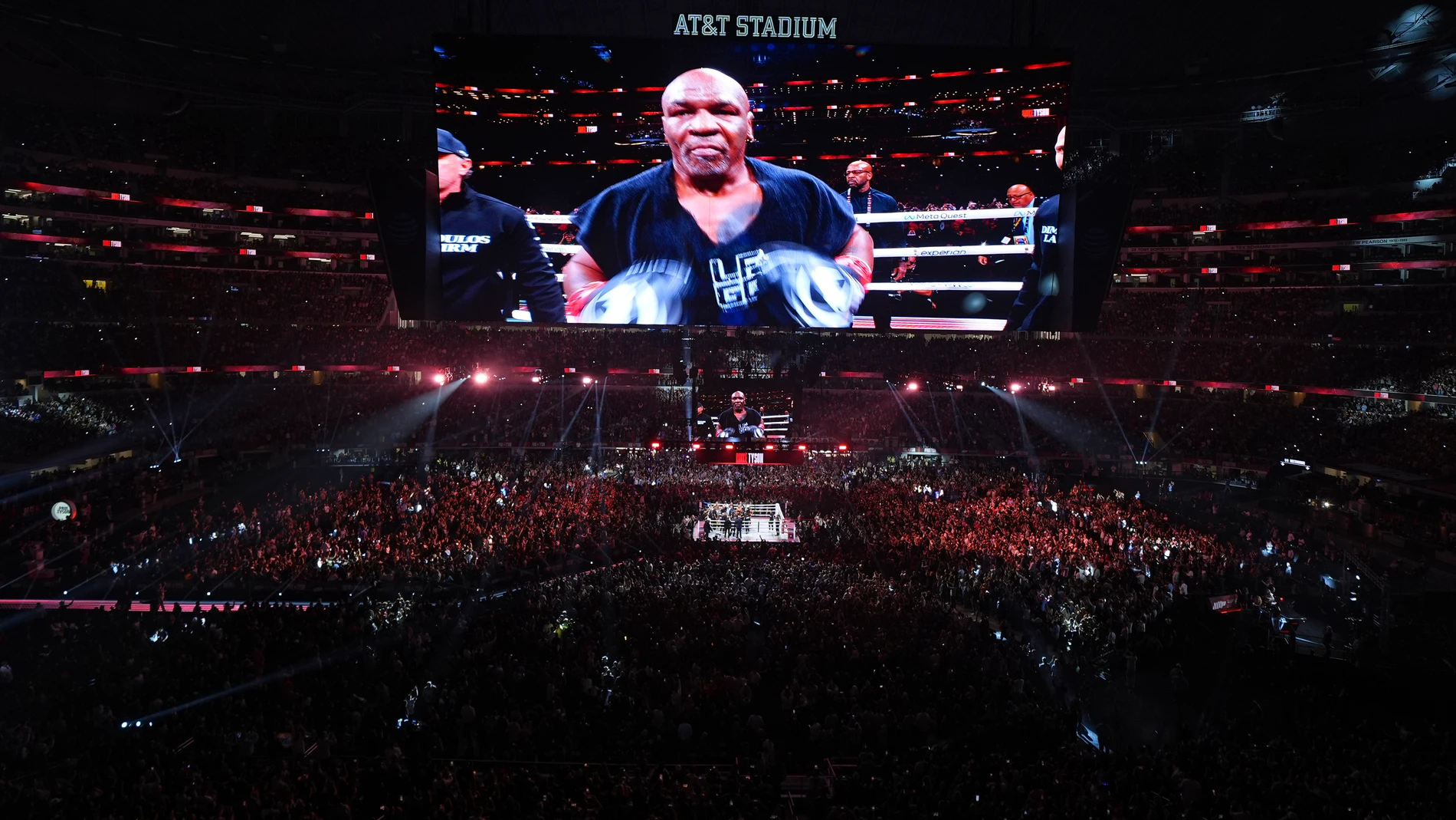 Mike Tyson walks to the ring before heavyweight boxing match against Jake Paul, Friday, Nov. 15, 2024, in Arlington, Texas. (AP Photo/Julio Cortez)
