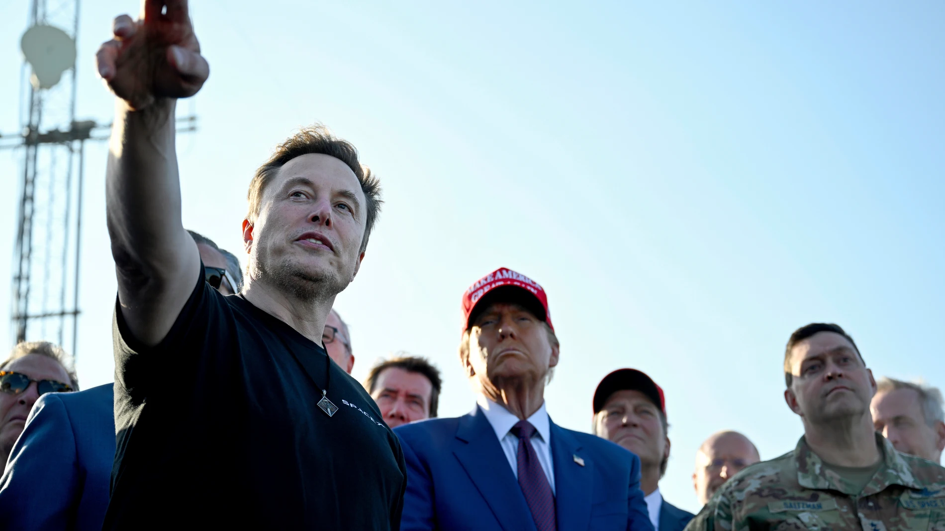 President-elect Donald Trump listens to Elon Musk at the launch of the sixth test flight of the SpaceX Starship rocket Tuesday, Nov. 19, 2024 in Boca Chica, Texas. (Brandon Bell/Pool via AP)