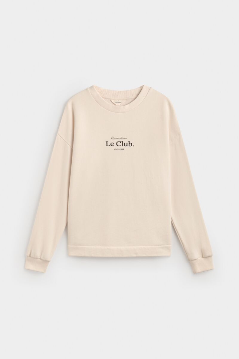 Sudadera en crema.