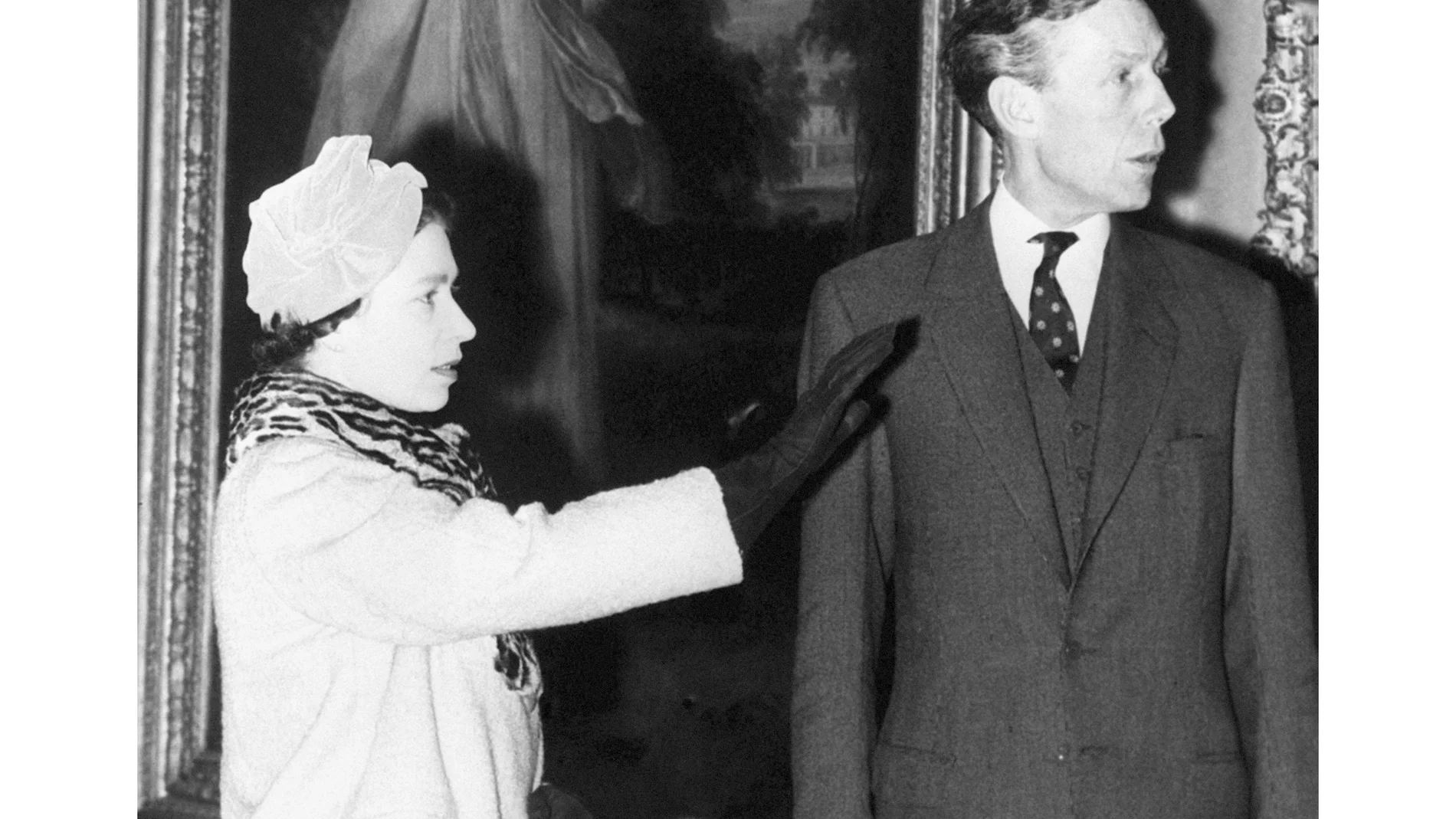 FILE - Professor Anthony Blunt, former surveyor of the Queen's pictures, photographed at the Courtauld Institute with Queen Elizabeth II on Nov. 15, 1979. (PA via AP, File)