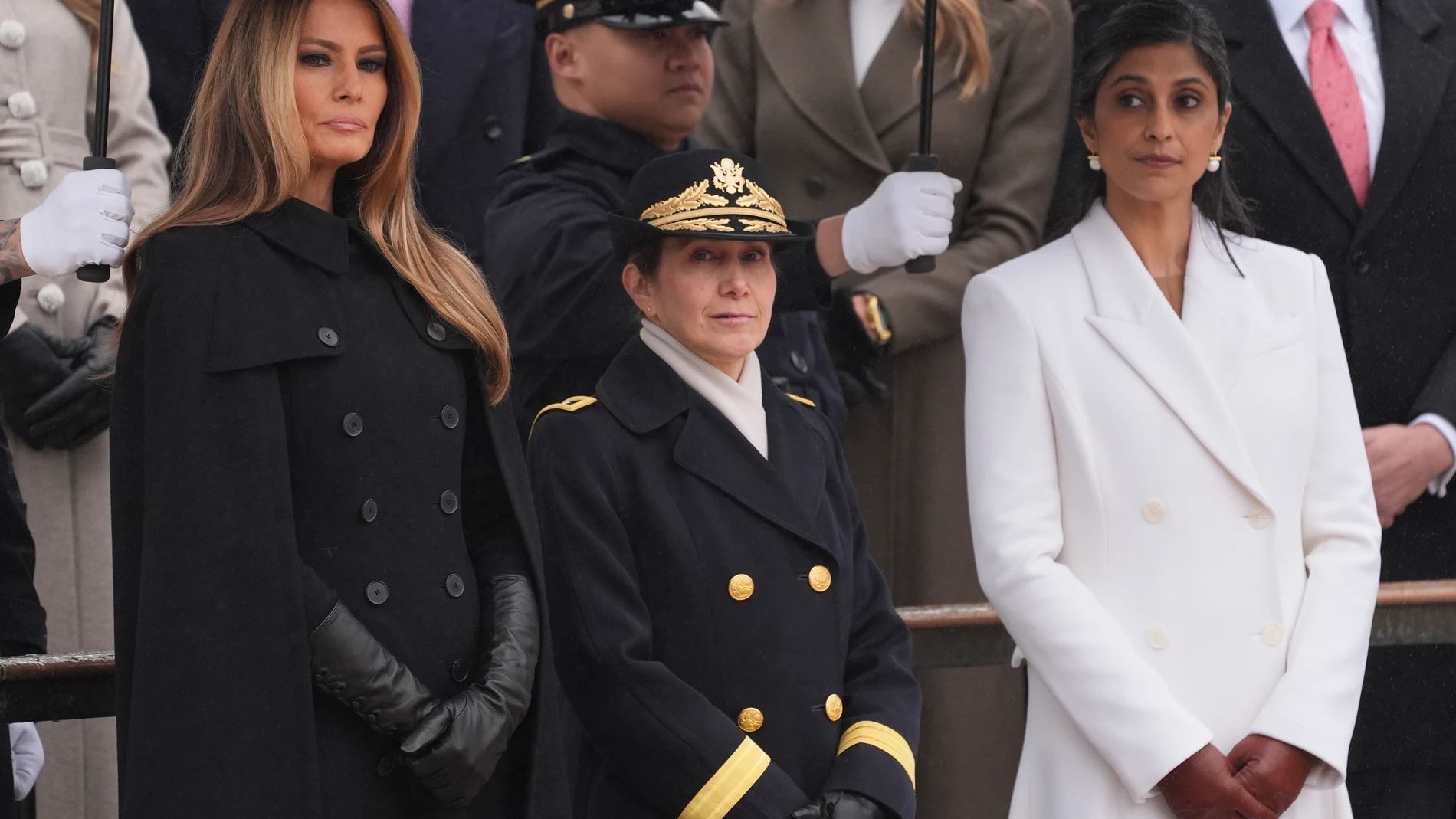 Melania Trump and Usha Vance arrive before President-elect Donald Trump participates in a wreath laying ceremony at Arlington National Cemetery, Sunday, Jan. 19, 2025, in Arlington, Va. (AP Photo/Evan Vucci)