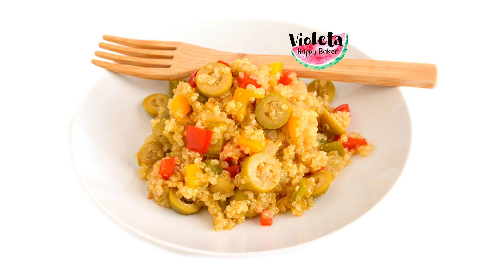 Plato de quinoa con verduras y un tenedor