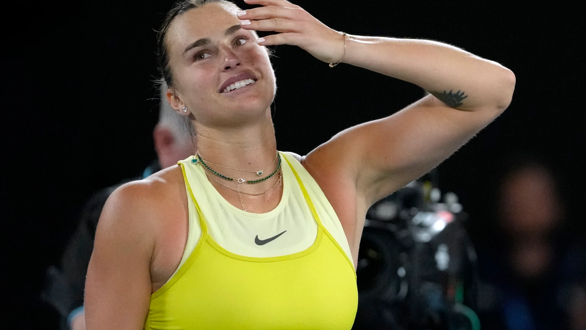 Aryna Sabalenka of Belarus celebrates after defeating Paula Badosa of Spain in their semifinal match at the Australian Open tennis championship in Melbourne, Australia, Thursday, Jan. 23, 2025. (AP Photo/Manish Swarup)