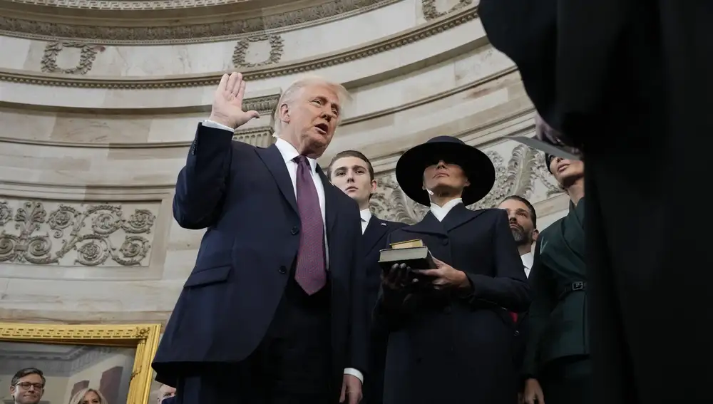 U.S. President-elect Donald Trump takes the oath of office as Melania Trump, Ivanka Trump, Donald Trump Jr. and Eric Trump look on during inauguration ceremonies in the Rotunda of the U.S. Capitol on January 20, 2025 in Washington, DC.
