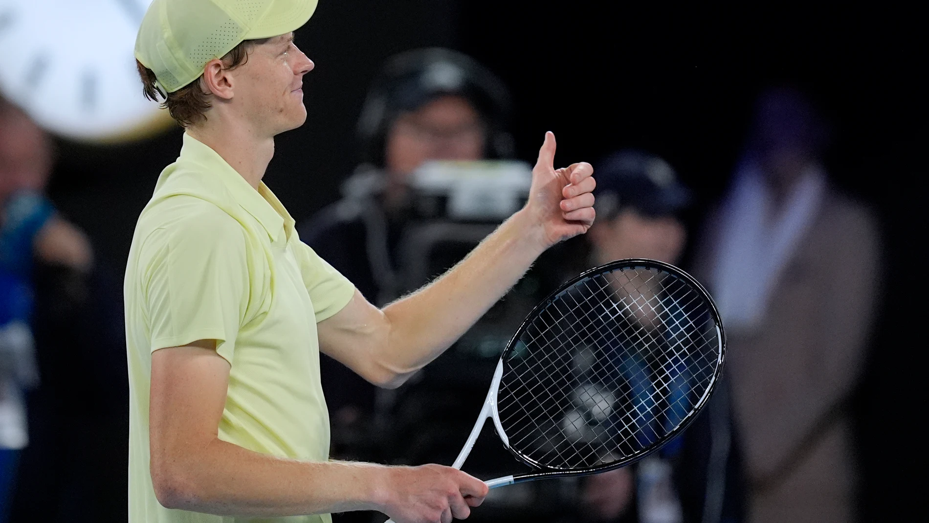 Jannik Sinner of Italy celebrates after defeating Ben Shelton of the U.S. in their semifinal match at the Australian Open tennis championship in Melbourne, Australia, Friday, Jan. 24, 2025. (AP Photo/Asanka Brendon Ratnayake)
