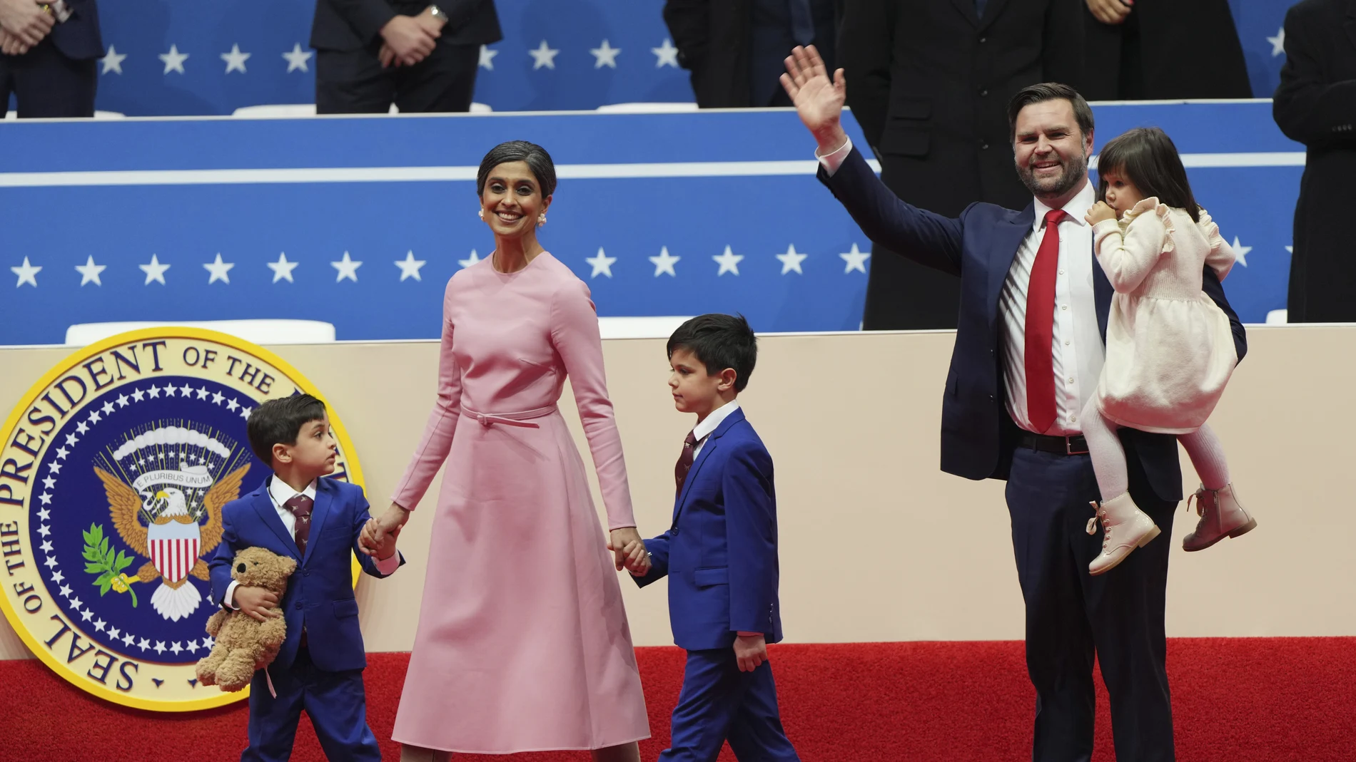 Vice President JD Vance, second right, his wife Usha Vance, second left, and their children Vivek, from left, Ewan and Mirabel arrive at an indoor Presidential Inauguration parade event in Washington, Monday, Jan. 20, 2025.