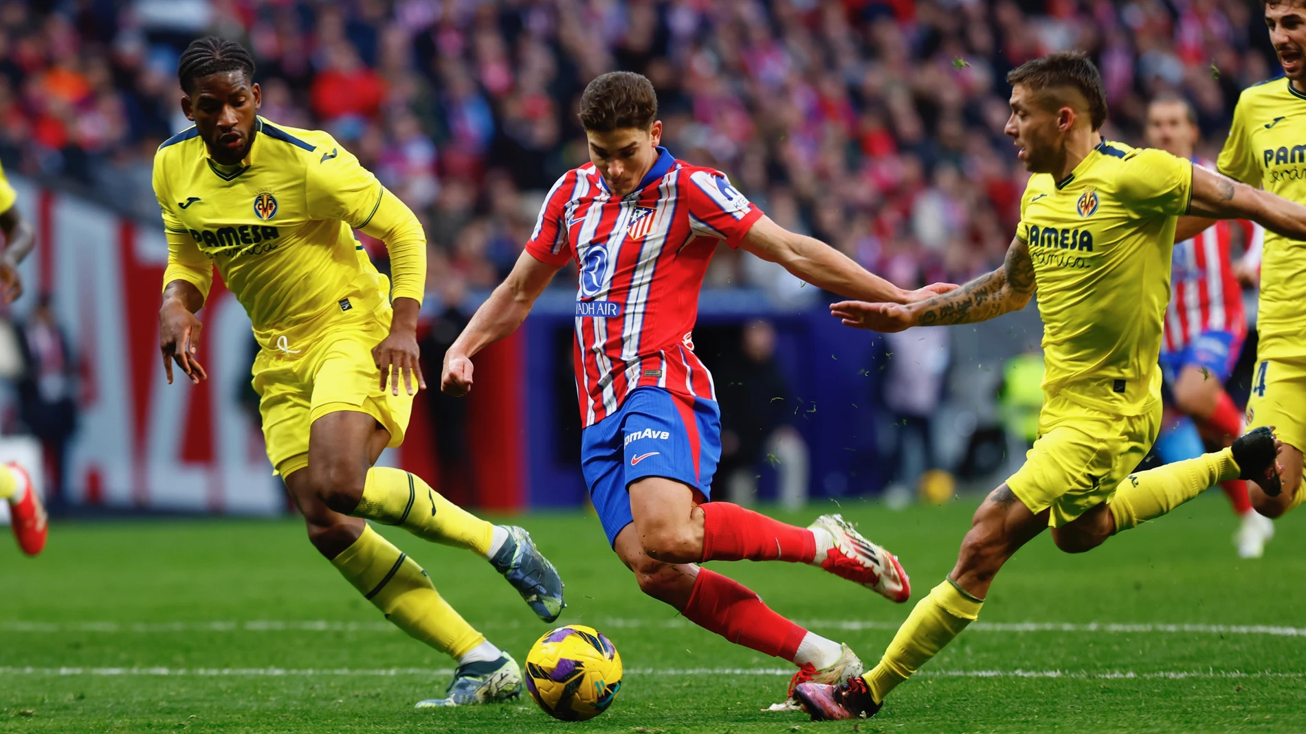 Encuentro de liga entre el Atlético de Madrid y el Villarreal. © Jesús G. Feria.