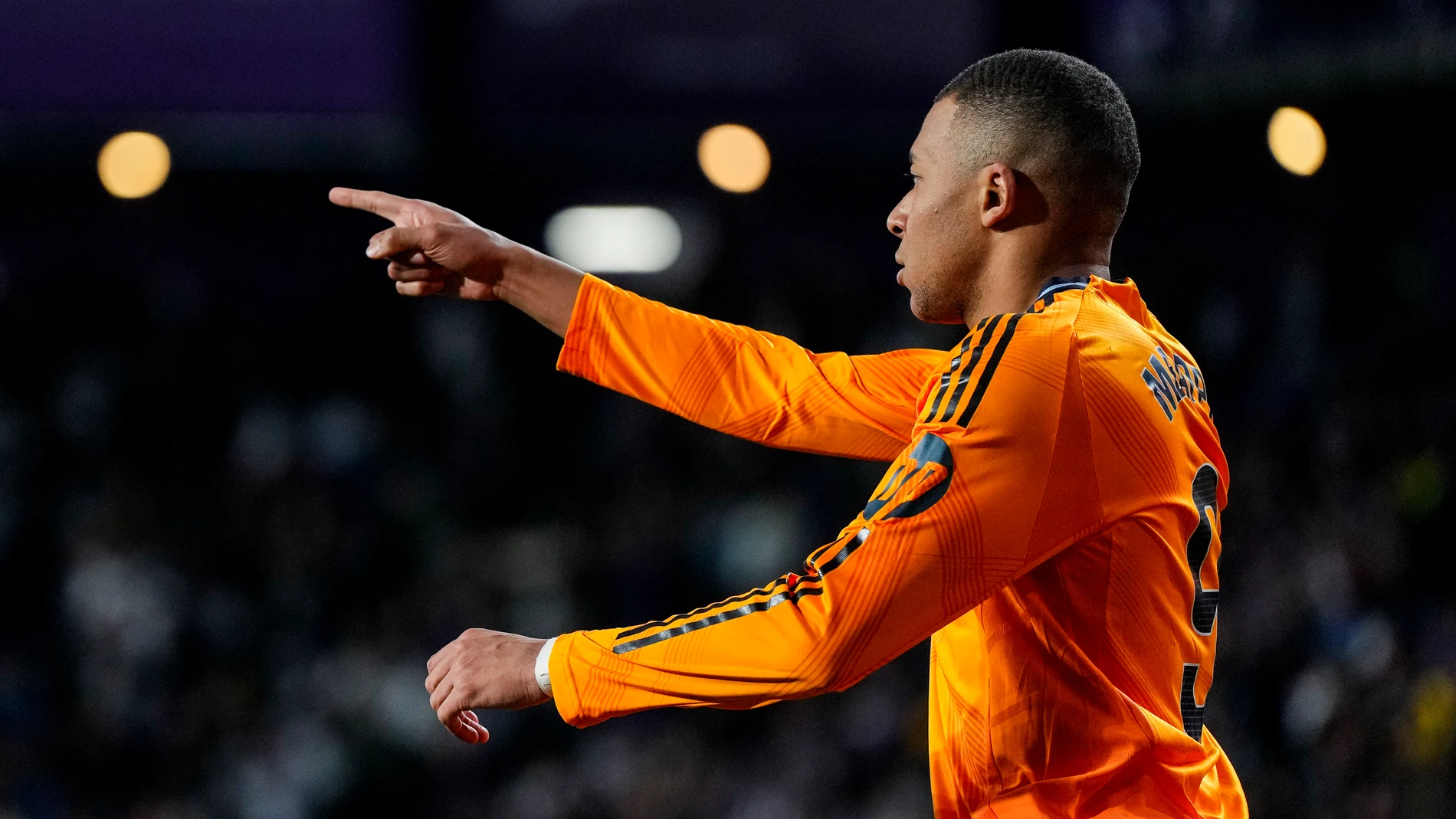 Real Madrid's Kylian Mbappe celebrates after scoring his side's first goal during the Spanish La Liga soccer match between Valladolid and Real Madrid at the Jose Zorrilla stadium in Valladolid, Spain, Saturday, Jan. 25, 2025. (AP Photo/Manu Fernandez)