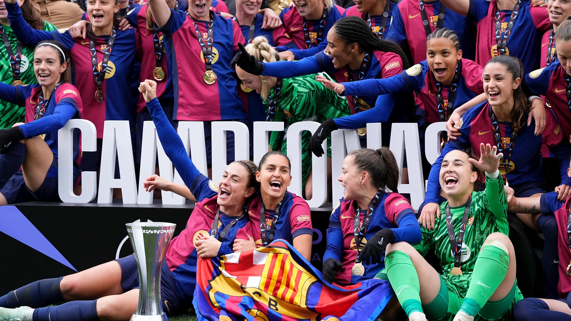 Players of FC Barcelona celebrate with the trophy during the Spanish Women SuperCup, Supercopa de Espana Femenina, final match played between FC Barcelona and Real Madrid at Butarqe stadium on January 26, 2025, in Madrid, Spain. AFP7 26/01/2025 ONLY FOR USE IN SPAIN