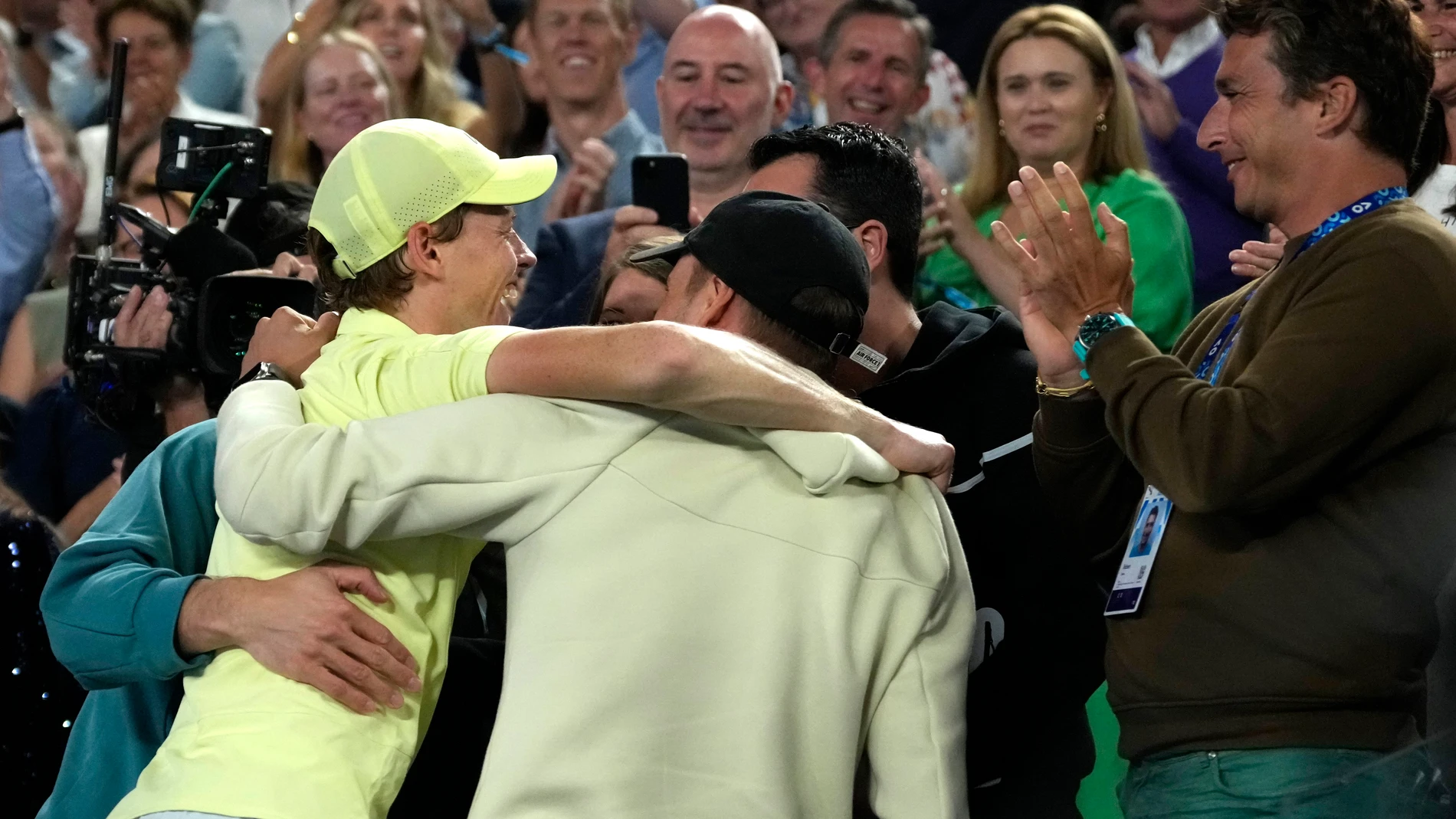 Jannik Sinner of Italy celebrates with supporters after defeating Alexander Zverev of Germany in the men's singles final at the Australian Open tennis championship in Melbourne, Australia, Sunday, Jan. 26, 2025. (AP Photo/Asanka Brendon Ratnayake)