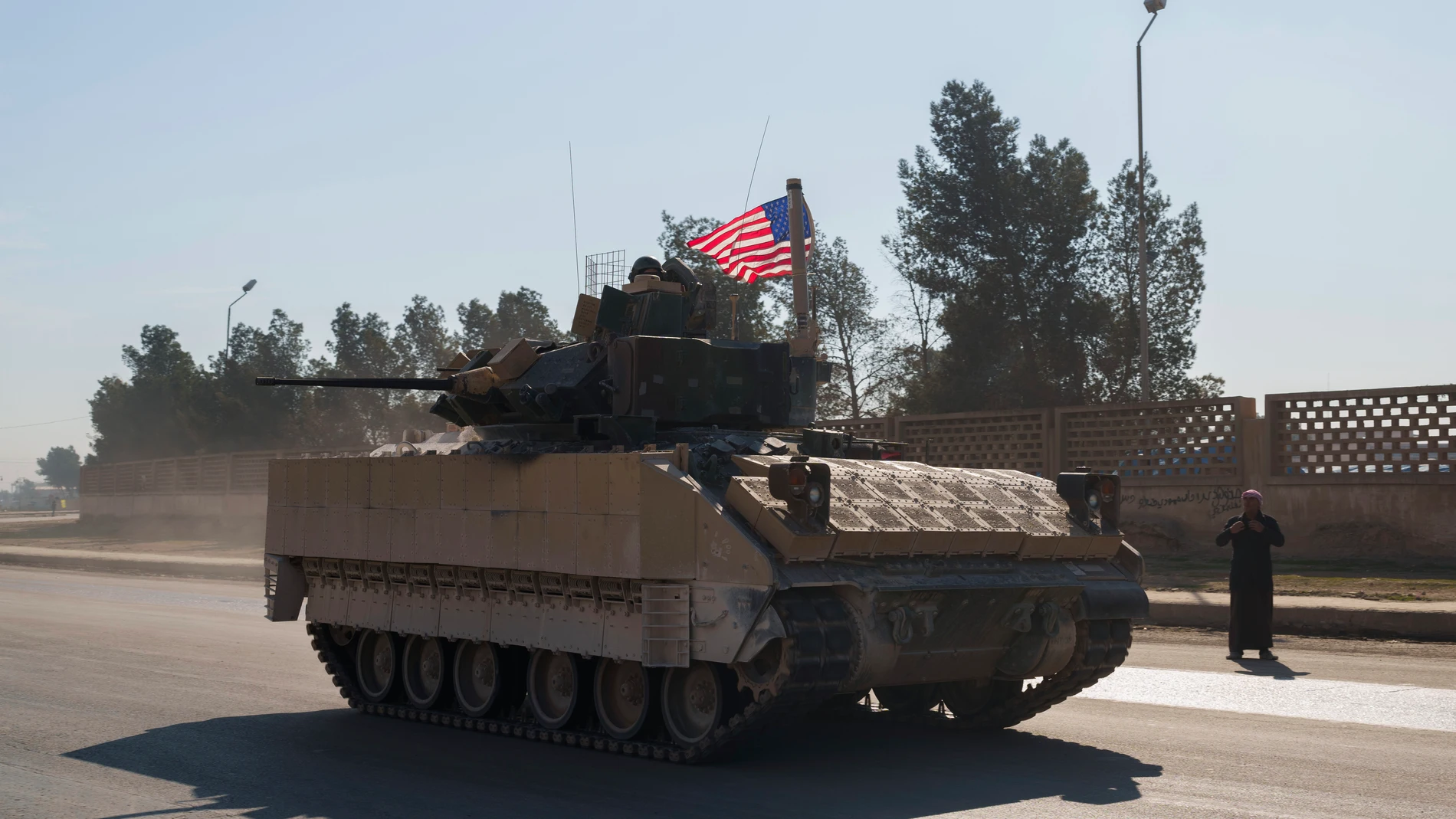 A U.S. Bradley Fighting Vehicle drives through the northeastern Syria's Hassakeh province, that is controlled by the US-backed and Kurdish-led Syrian Democratic Forces, Friday, Jan. 31, 2025. (AP Photo/Bernat Armangue)