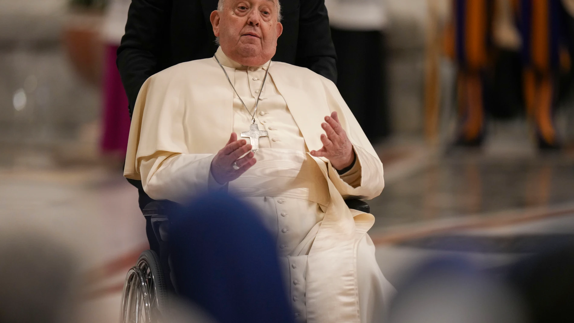 Pope Francis leaves after leading a Vespers celebration in St. Peter's Basilica at the Vatican, Saturday, Feb. 1, 2025. (AP Photo/Andrew Medichini)