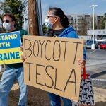 Protest outside Tesla dealership in Decatur, Georgia over Musk's government role