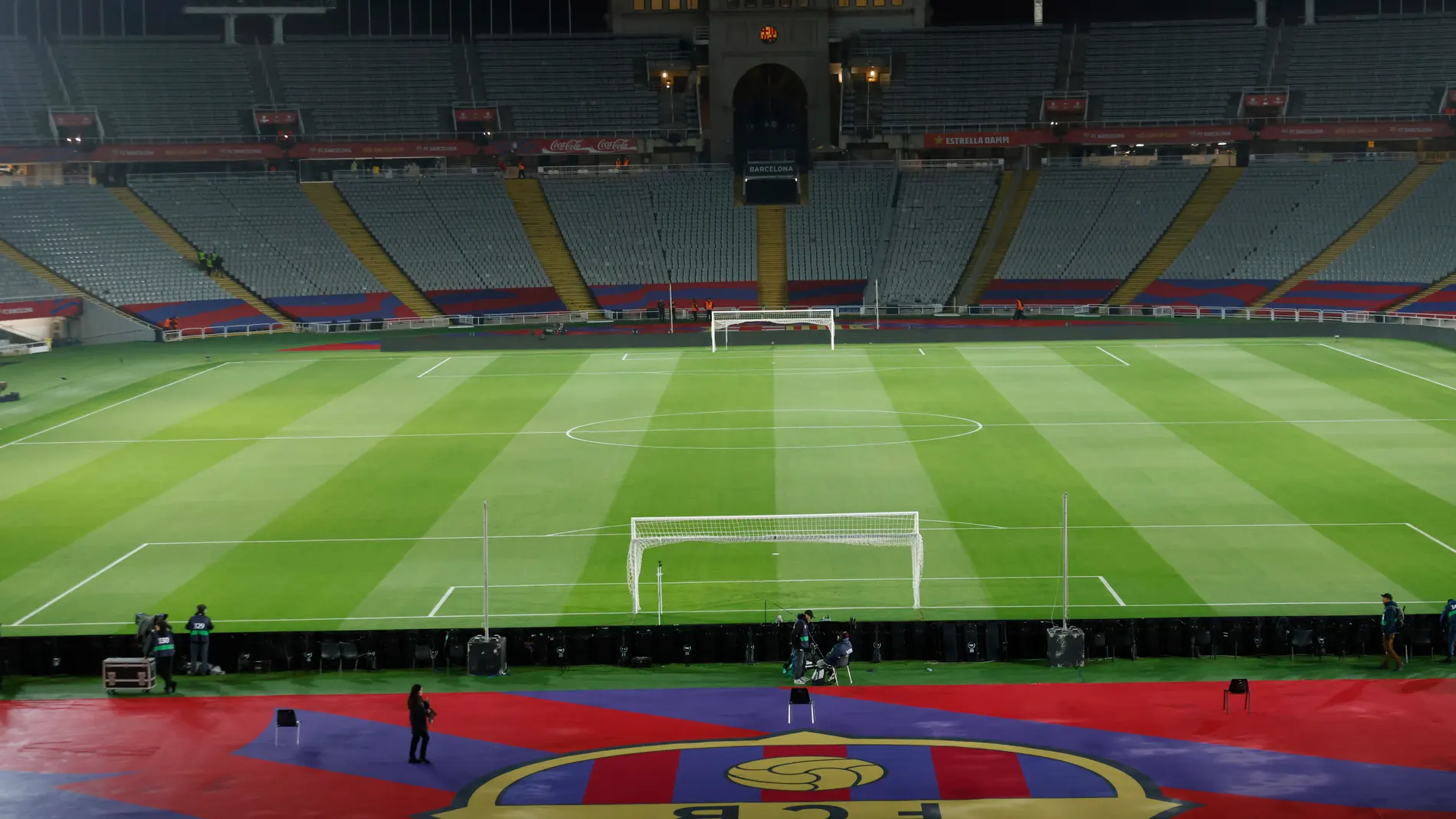 Empty stands and field seen after the cancellation of the Spanish La Liga soccer match between Barcelona and Osasuna, at the Lluis Companys Olympic Stadium, in Barcelona, Spain, Saturday, March 8, 2025. (AP Photo/Joan Monfort)