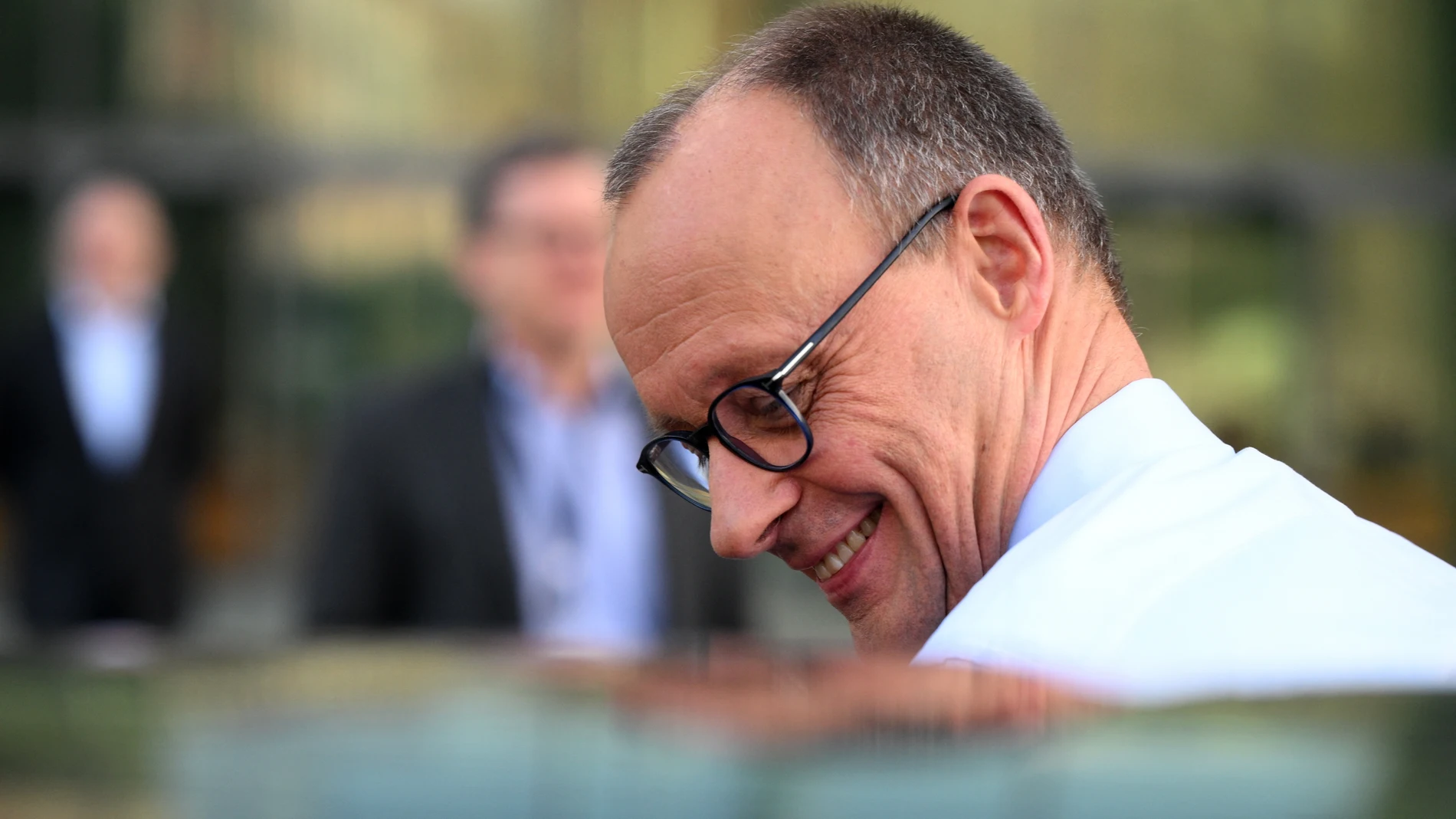 The leader of Germany's Christian Democratic Union (CDU) party Friedrich Merz gets into a car as he leaves after giving a statement in Berlin on March 8, 2025, as exploratory talks were held between the conservative CDU/CSU union and the social democratic SPD party on forming a future government coalition following Germany's February 23 general election.