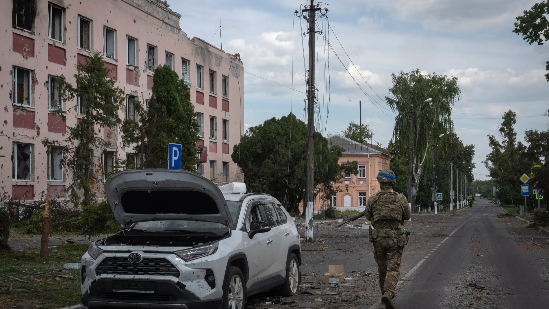 FILE - A Ukrainian soldier walks past at a city hall in Sudzha, Kursk region, Russia, Friday, Aug. 16, 2024. This image was approved by the Ukrainian Defense Ministry before publication. (AP Photo, File)