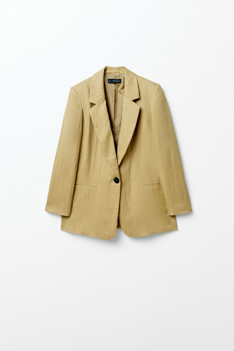 Chaqueta traje tejido.