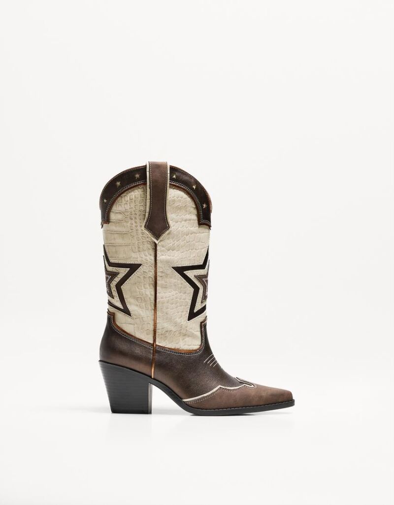 Botines tacón cowboy bordados.