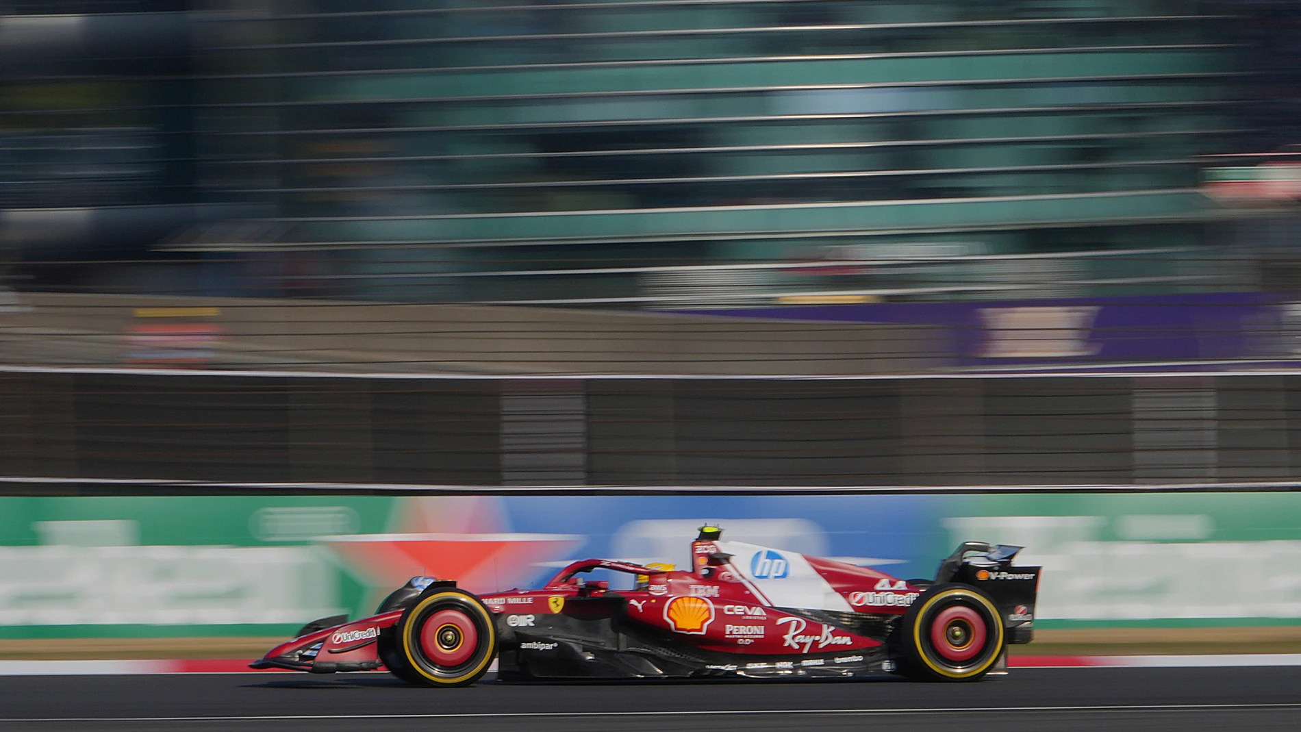 Ferrari driver Lewis Hamilton of Britain steers his car during the sprint qualifying at the Shanghai International Circuit in Shanghai, China, Friday, March 21, 2025, ahead of the Chinese Formula One Grand Prix (Sunday). (AP Photo/Andy Wong)