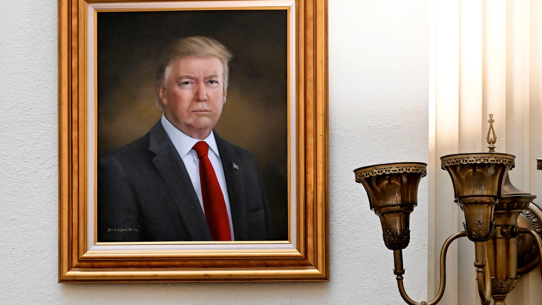 A portrait of President Donald Trump hangs on a wall in the rotunda on the third floor of the Colorado Capitol, Monday, March 24, 2025, in Denver. (Helen H. Richardson/The Denver Post via AP)