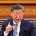 China's President Xi Jinping hosts international business meeting