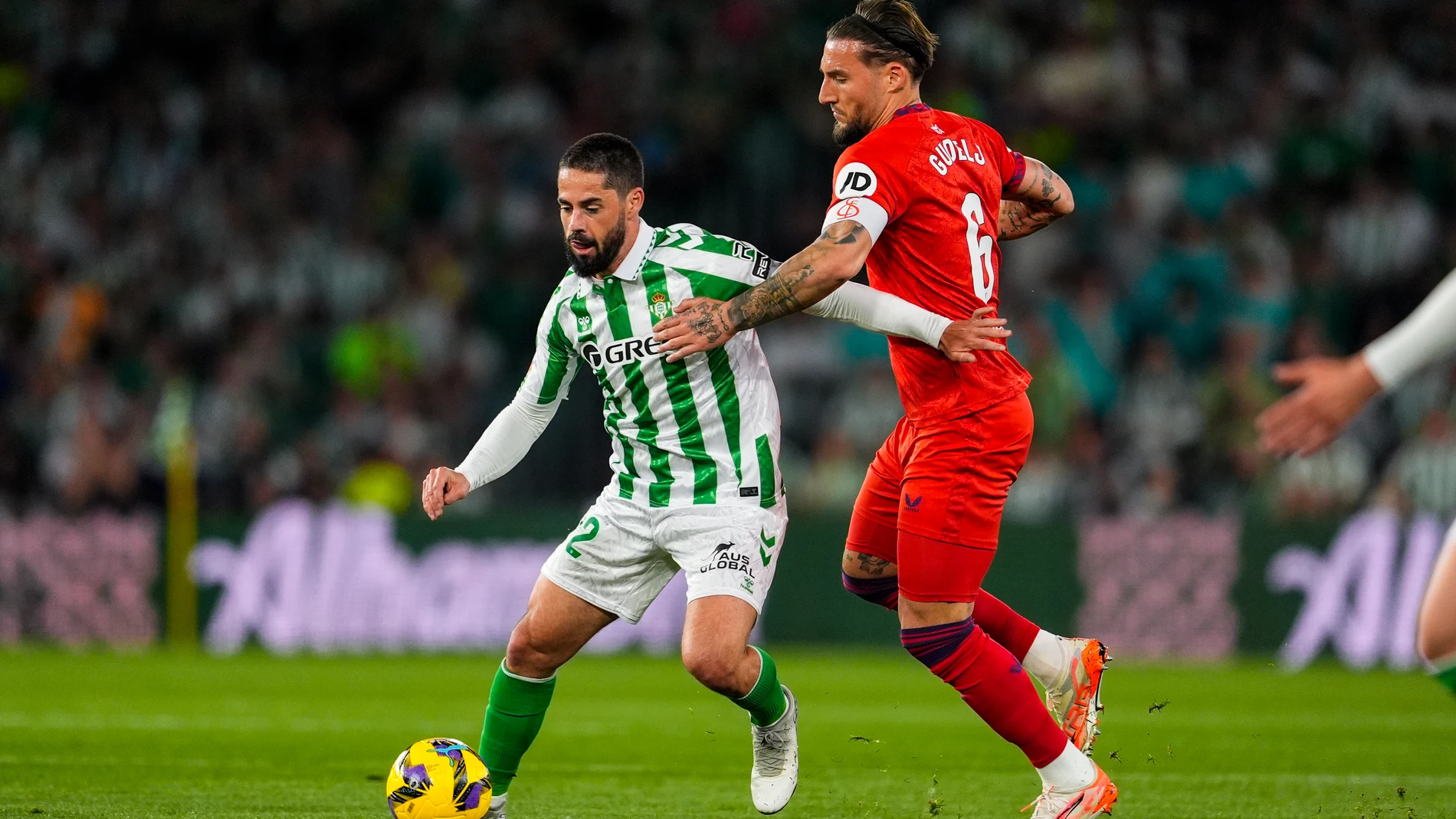 Francisco 'Isco' Alarcon of Real Betis and Nemanja Gudelj of Sevilla FC in action during the Spanish league, LaLiga EA Sports, football match played between Real Betis and Sevilla FC at Benito Villamarin stadium on March 30, 2025, in Sevilla, Spain. AFP7 30/03/2025 ONLY FOR USE IN SPAIN
