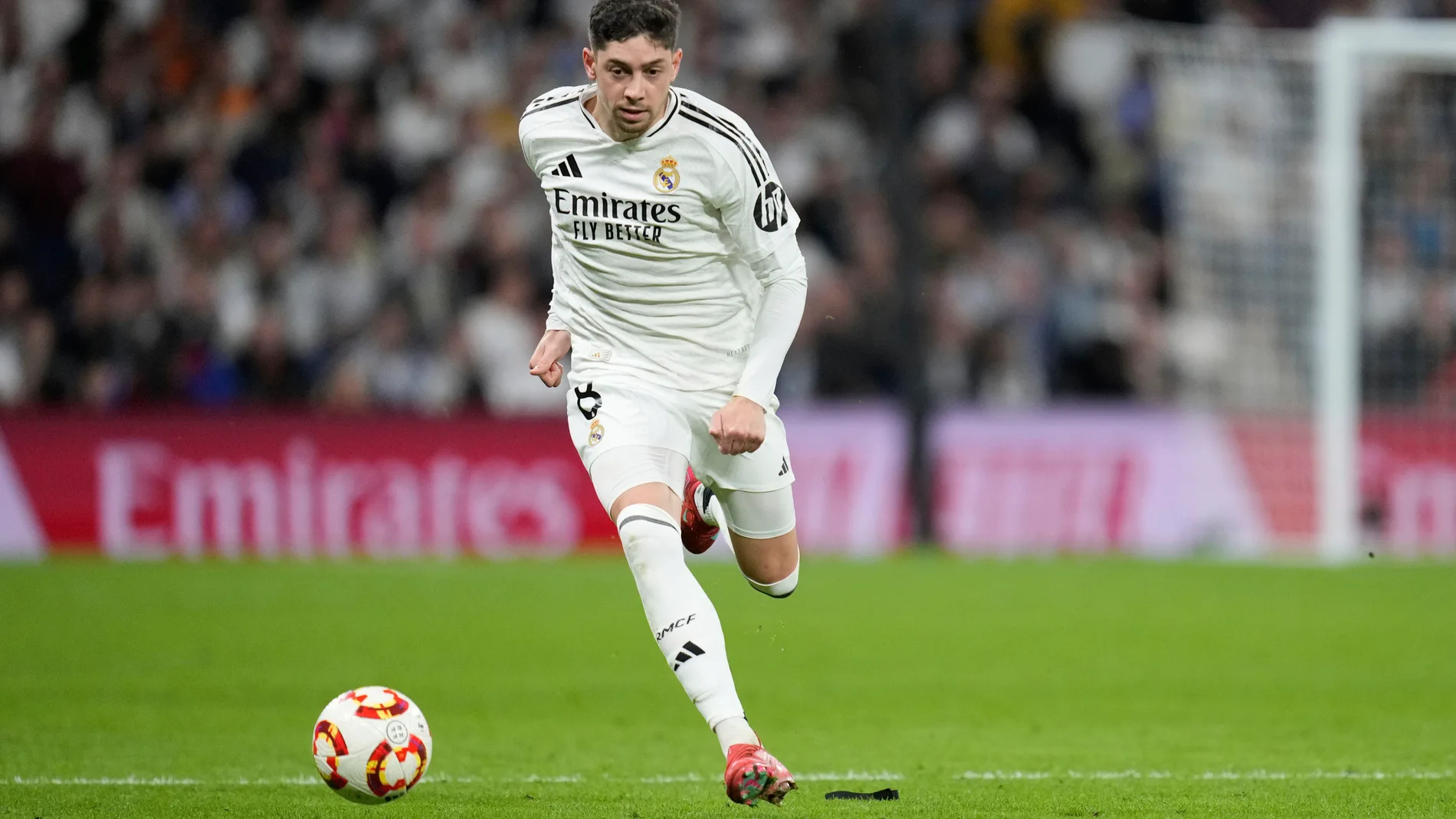 Real Madrid's Federico Valverde in action during the Spanish Copa del Rey semifinal second leg soccer match between Real Madrid and and Real Sociedad in Madrid, Spain Tuesday, April 1, 2025. (AP Photo/Bernat Armangue)