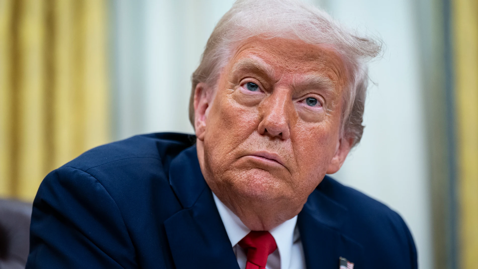 March 31, 2025, Washington, District Of Columbia, USA: US President Donald Trump during an executive order signing in the Oval Office of the White House in Washington, DC, US, on Monday, March 31, 2025. The order directs the Federal Trade Commission to work with the Department of Justice to ensure that competition laws are enforced in the concert and entertainment industry, and pushes state consumer protection authorities on enforcementEuropa Press/Contacto/Al Drago - Pool via CNP31/03/20...