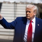 US President Donald Trump departs the White House