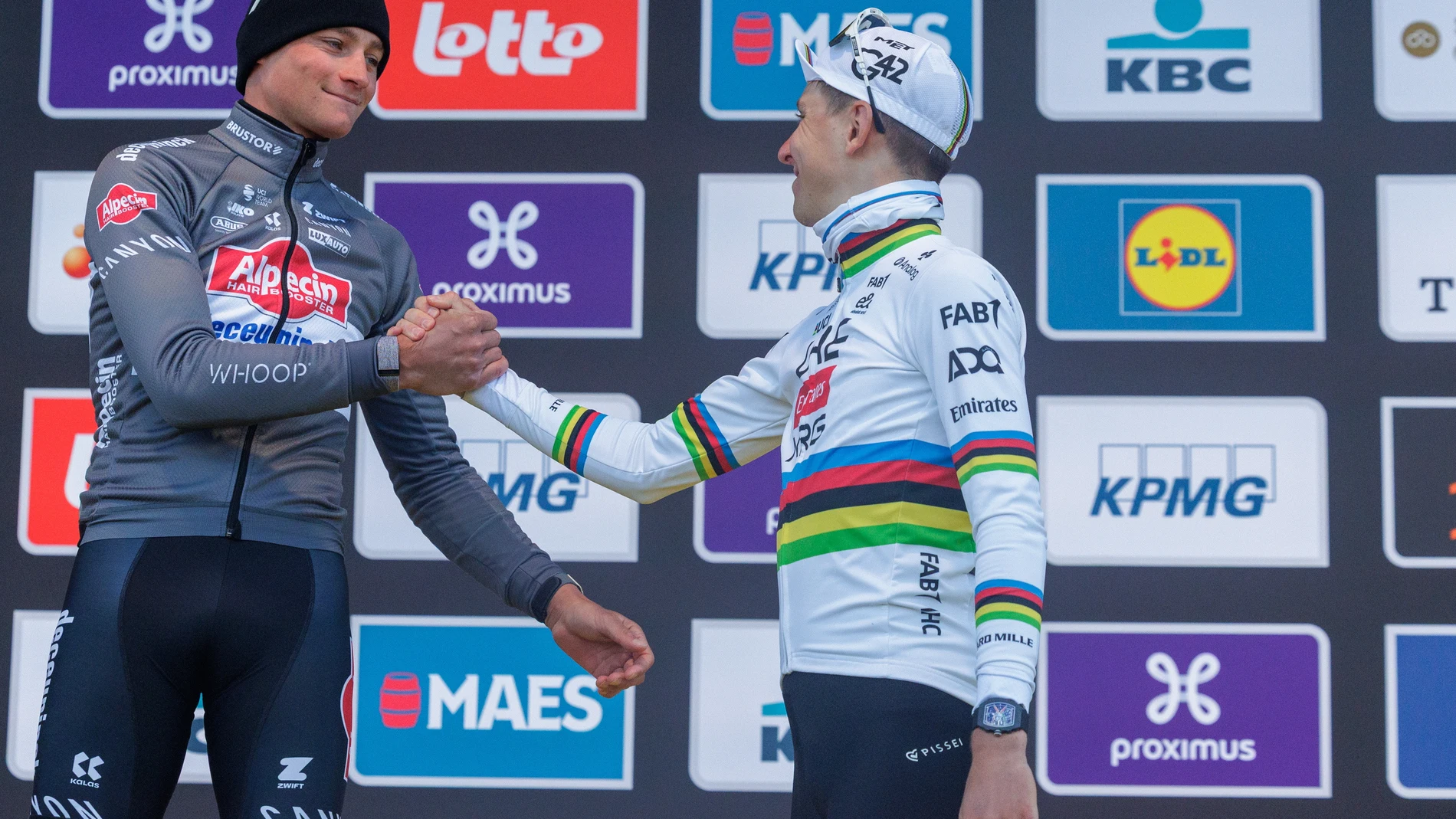 OUDENAARDE (Belgium), 06/04/2025.- Winner Slovenian rider Tadej Pogacar of UAE Team Emirates XRG (R) and third placed Dutch rider Mathieu van der Poel of team Alpecin - Deceuninck celebrate on the podium at the Tour of Flanders one-day cycling race over 269km from Bruges to Oudenaarde, Belgium, 06 April 2025. (Ciclismo, Bélgica, Brujas) EFE/EPA/OLIVIER MATTHYS