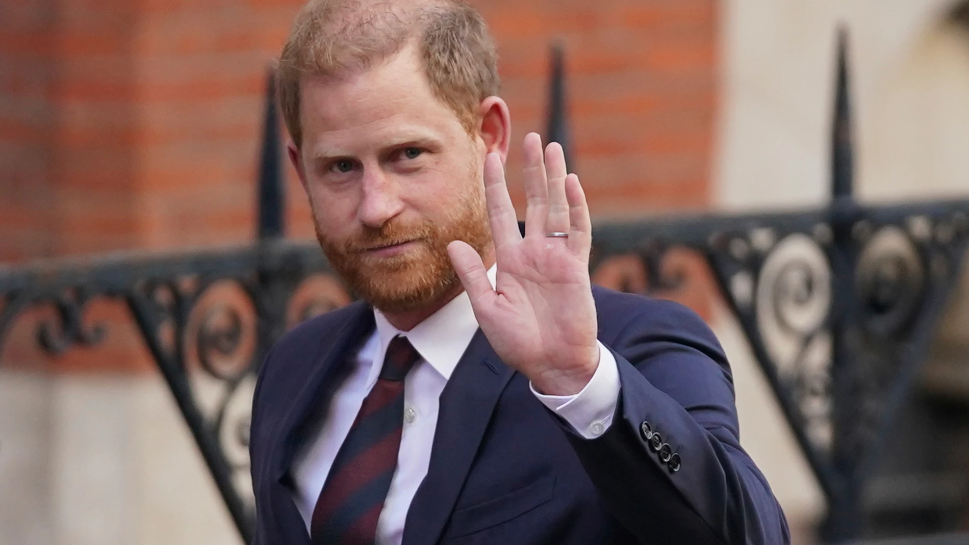 FILE - Prince Harry waves as he leaves the Royal Courts of Justice in London, Wednesday, April 9, 2025. (AP Photo/Alberto Pezzali, File)