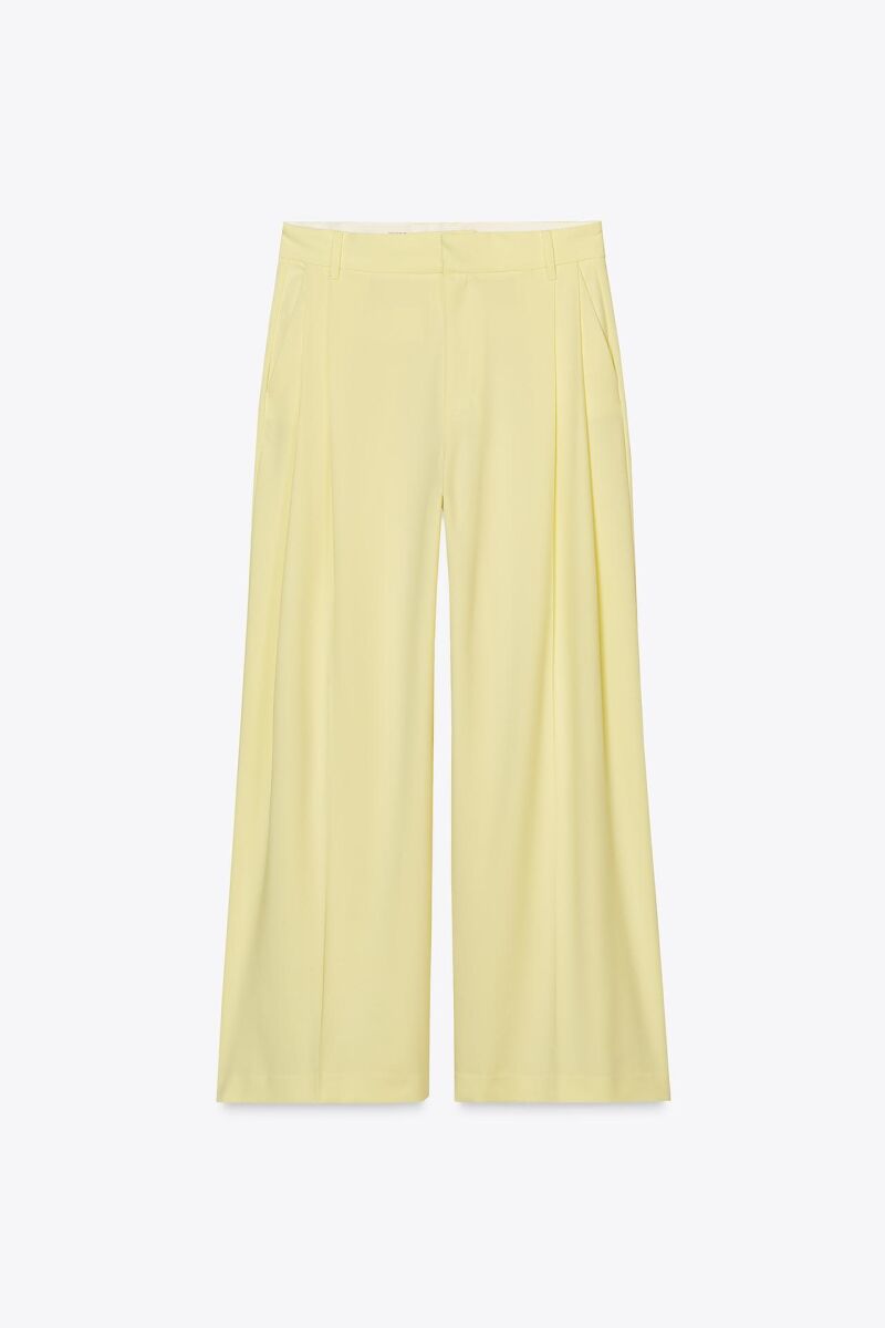 Pantalón traje doble pliegue.