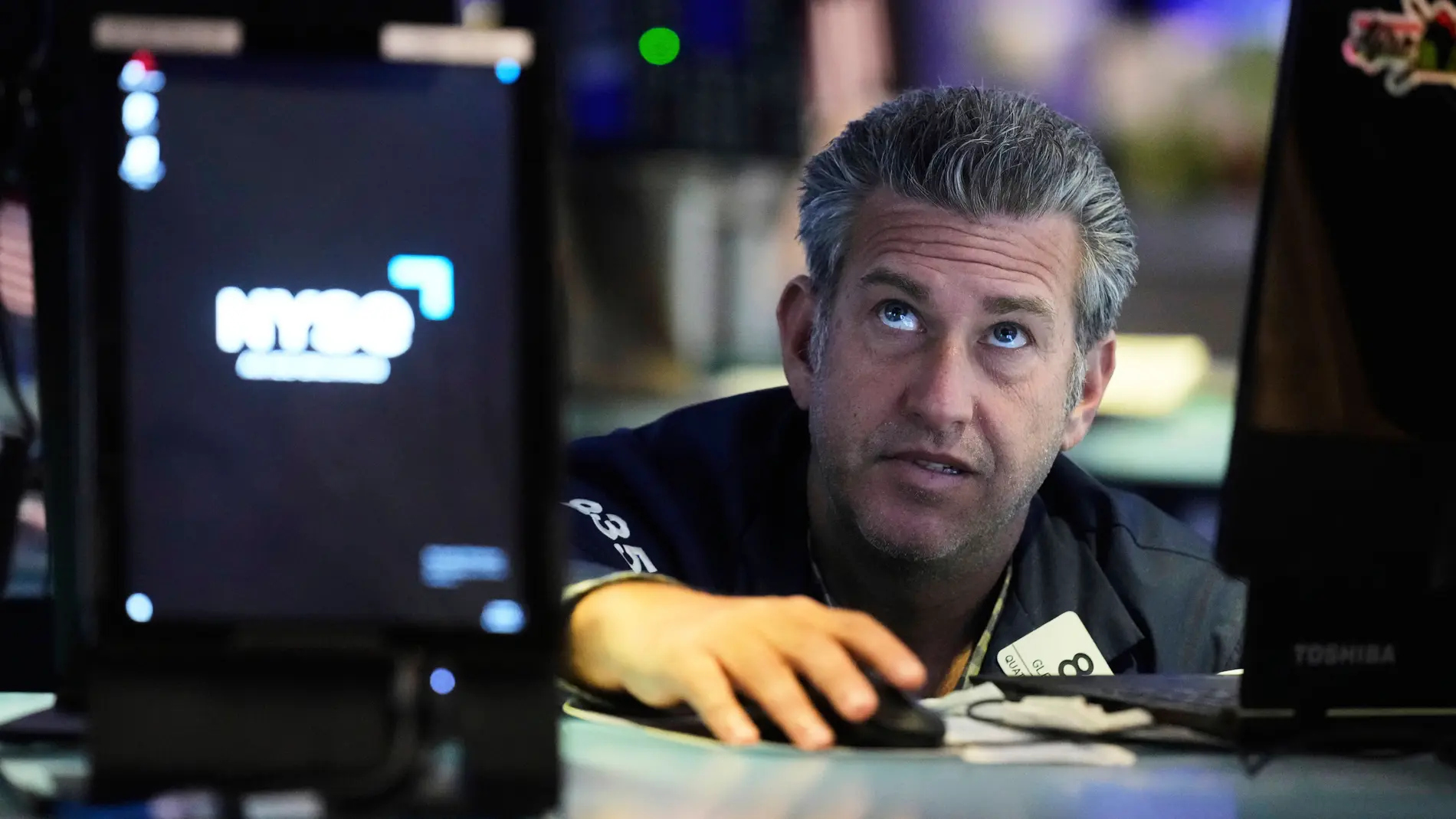 Trader Glenn Kessler works on the floor of the New York Stock Exchange, Monday, April 14, 2025. (AP Photo/Richard Drew)