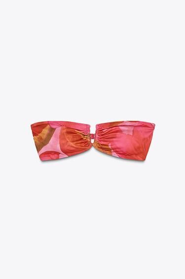 Top bikini bandeau estampado.