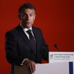 Macron hosts decoration ceremony for restorer of Notre-Dame Cathedral