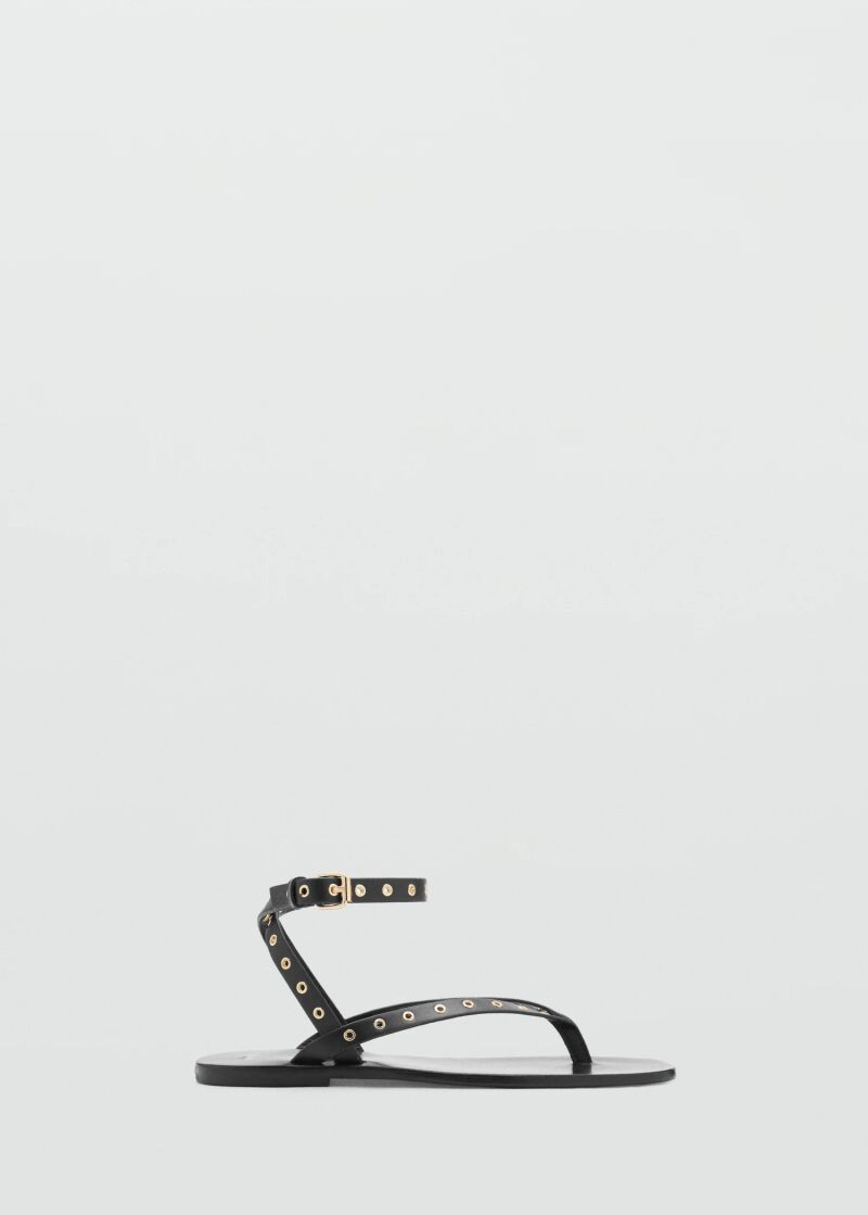 Sandalias planas con eyelets.